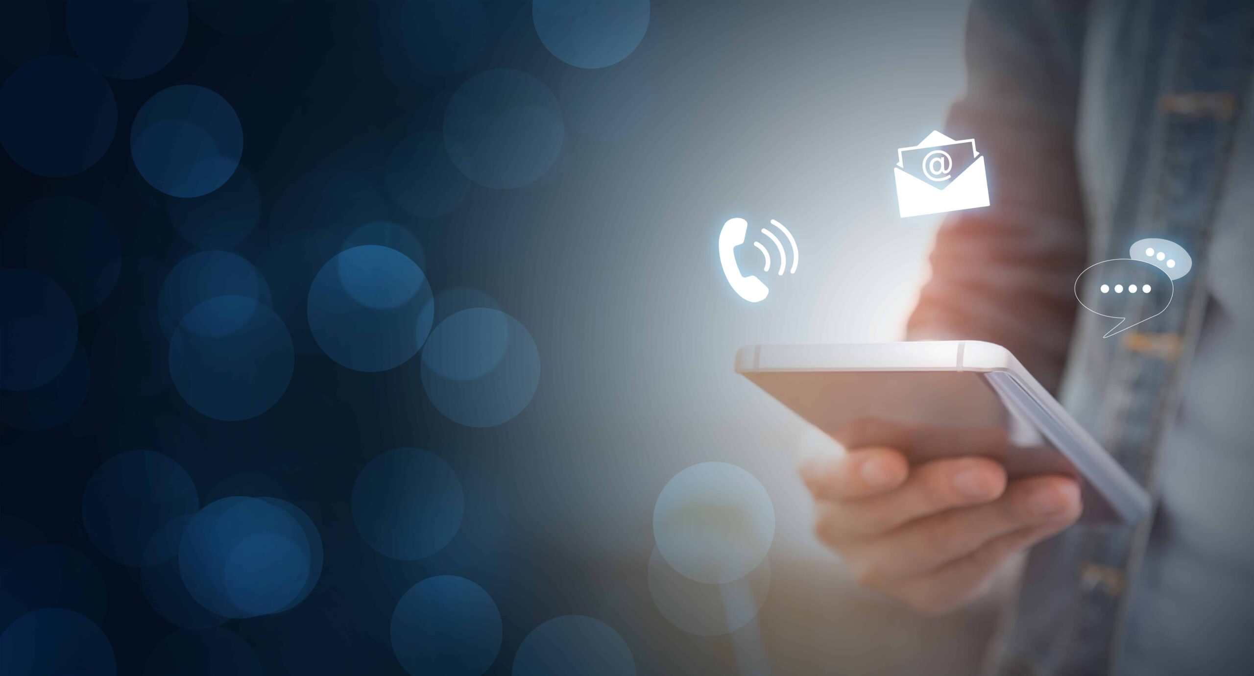 CONTACT US, Hand of a businessman holding a mobile smartphone with the icon. Contact us connection concept with copy space.